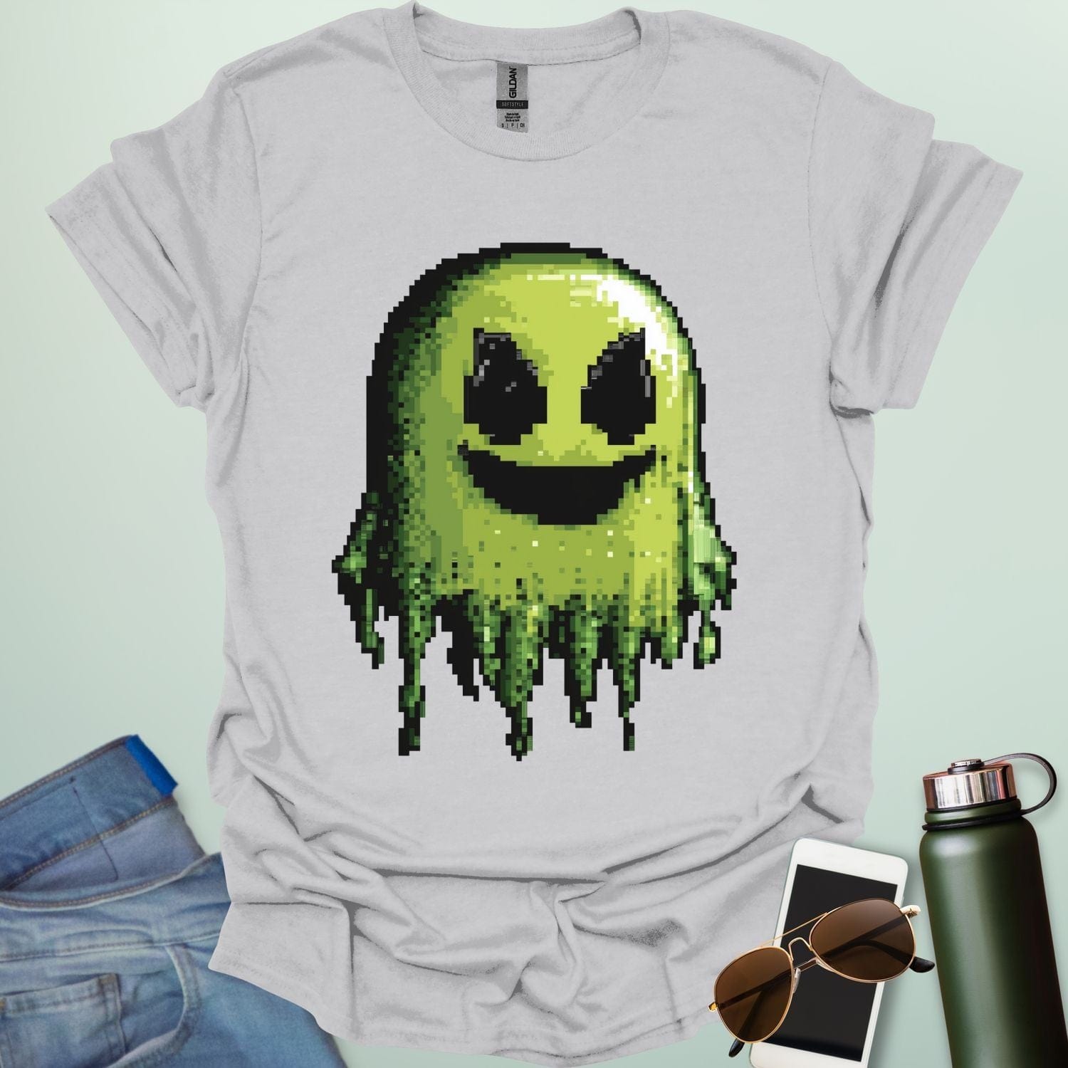 Pixel Ghost t-shirt featuring 8-bit style ghost graphic — a retro video-game inspired design for coders, gamers and lovers of spooky fun.