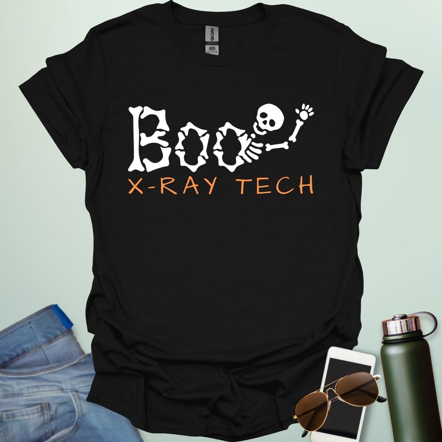 Boo X-Ray Tech t-shirt featuring X-ray imagery and spooky Halloween theme — design for radiology techs and medical imaging fans.