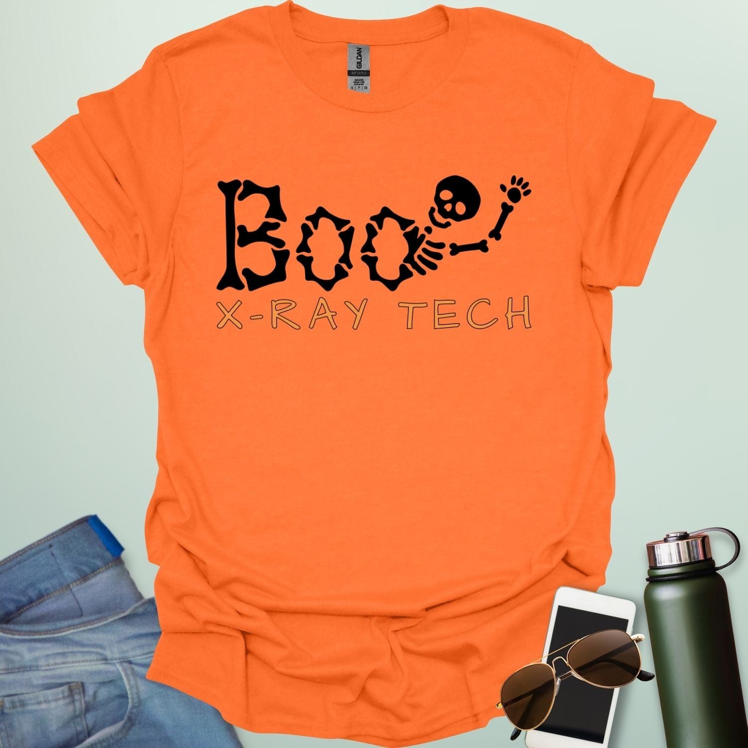 Boo X-Ray Tech t-shirt featuring X-ray imagery and spooky Halloween theme — design for radiology techs and medical imaging fans.