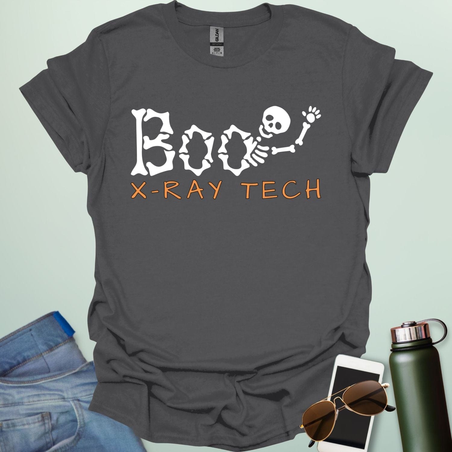 Boo X-Ray Tech t-shirt featuring X-ray imagery and spooky Halloween theme — design for radiology techs and medical imaging fans.