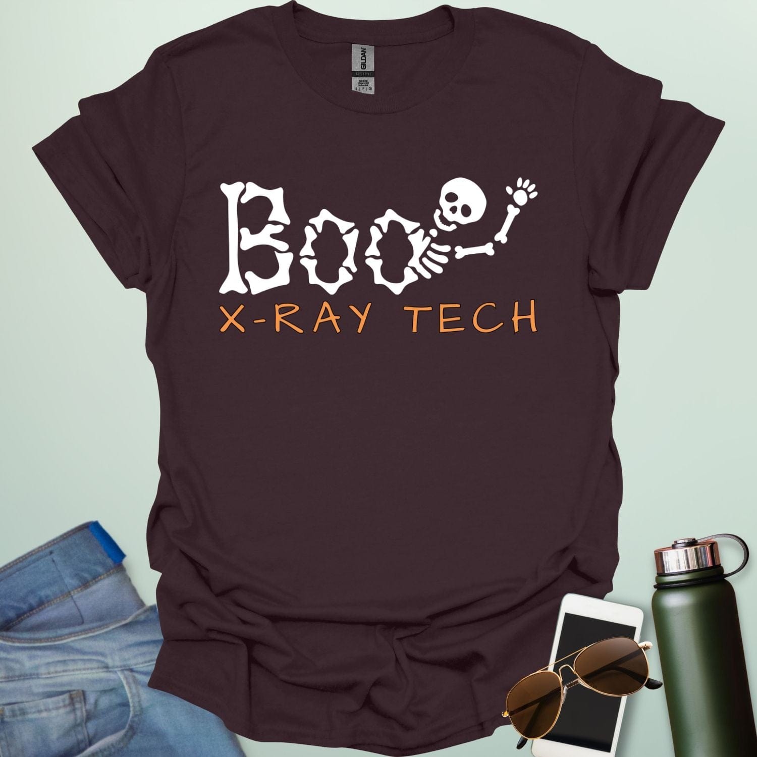 Boo X-Ray Tech t-shirt featuring X-ray imagery and spooky Halloween theme — design for radiology techs and medical imaging fans.