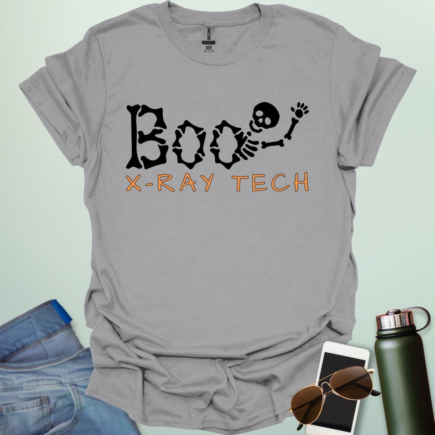 Boo X-Ray Tech t-shirt featuring X-ray imagery and spooky Halloween theme — design for radiology techs and medical imaging fans.