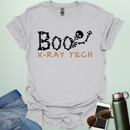 Boo X-Ray Tech t-shirt featuring X-ray imagery and spooky Halloween theme — design for radiology techs and medical imaging fans.