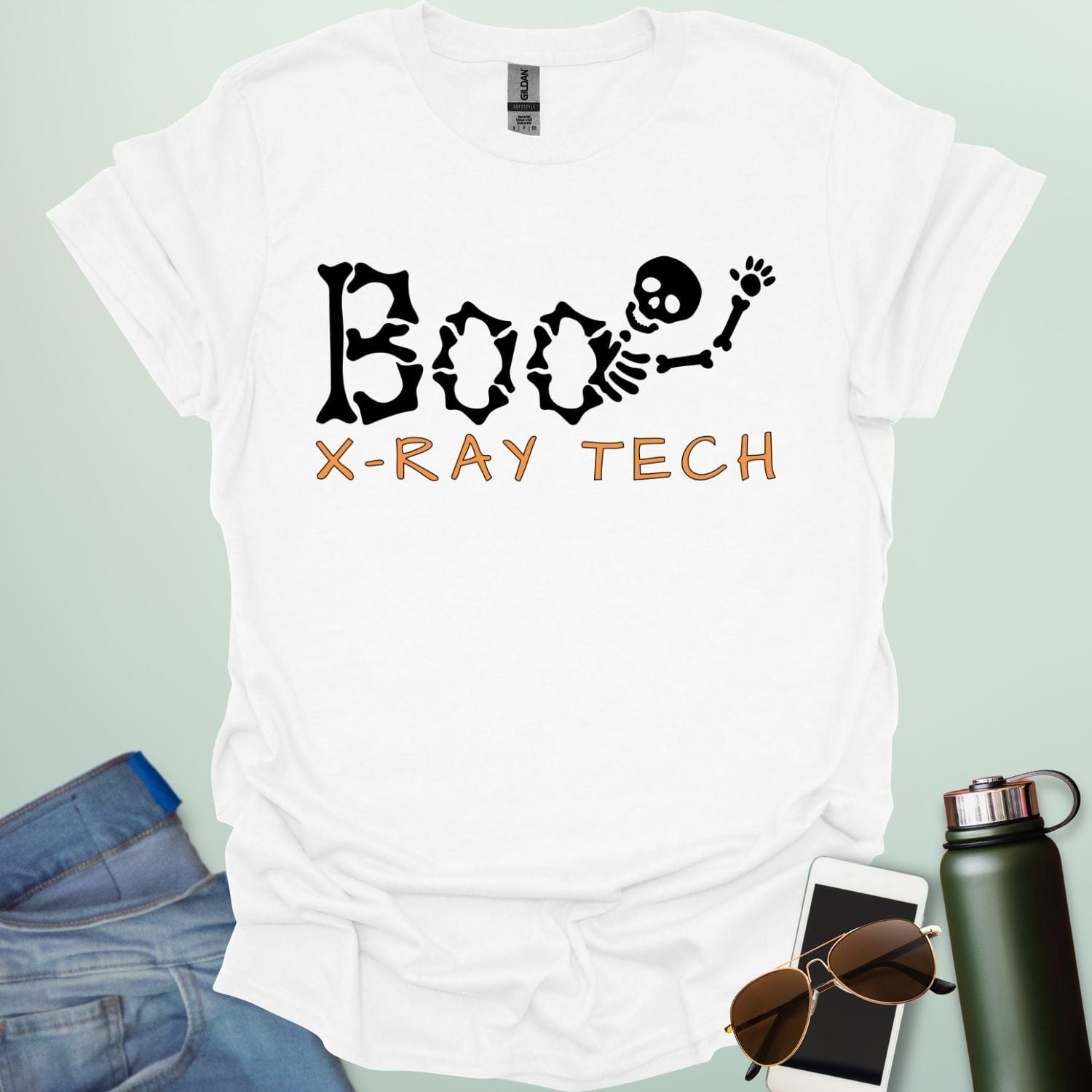 Boo X-Ray Tech t-shirt featuring X-ray imagery and spooky Halloween theme — design for radiology techs and medical imaging fans.