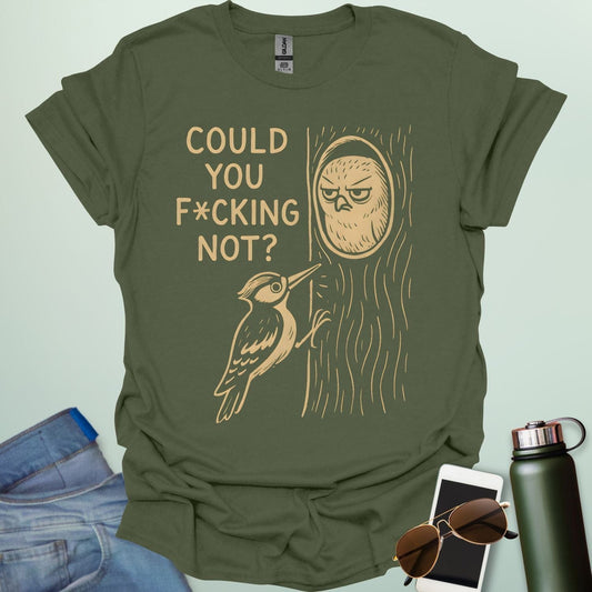 Minimal illustration of an irritated owl peeking from its tree burrow while a woodpecker pecks at the trunk, with bold text reading “COULD YOU F*CKING NOT?” on a dark background.
