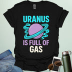 Graphic of the planet Uranus with fun typography reading “Uranus Is Full of Gas” — a humorous astronomy / space pun on a dark background.