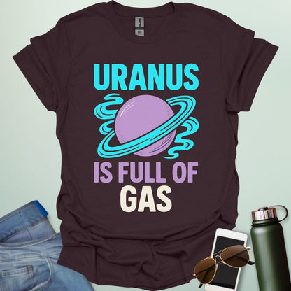 Graphic of the planet Uranus with fun typography reading “Uranus Is Full of Gas” — a humorous astronomy / space pun on a dark background.
