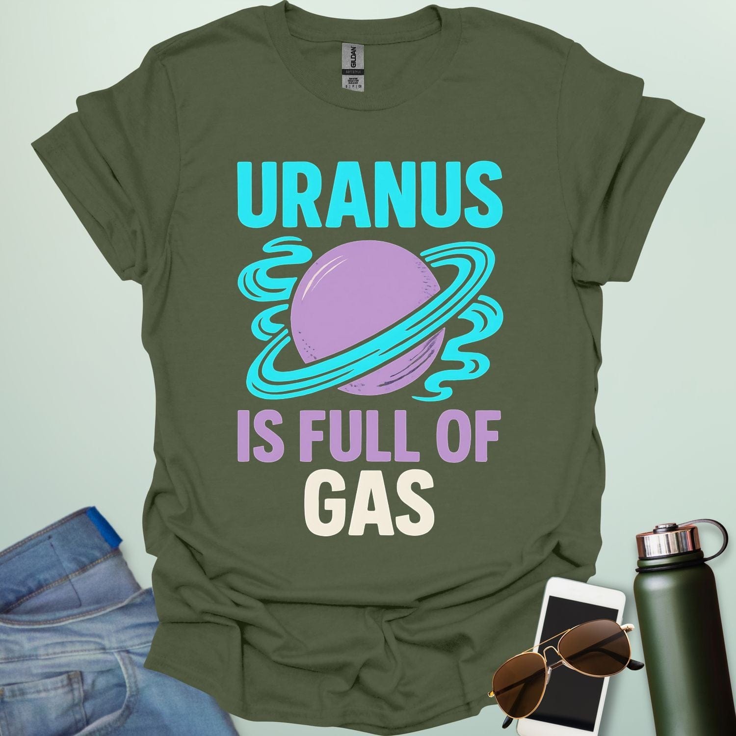 Graphic of the planet Uranus with fun typography reading “Uranus Is Full of Gas” — a humorous astronomy / space pun on a dark background.