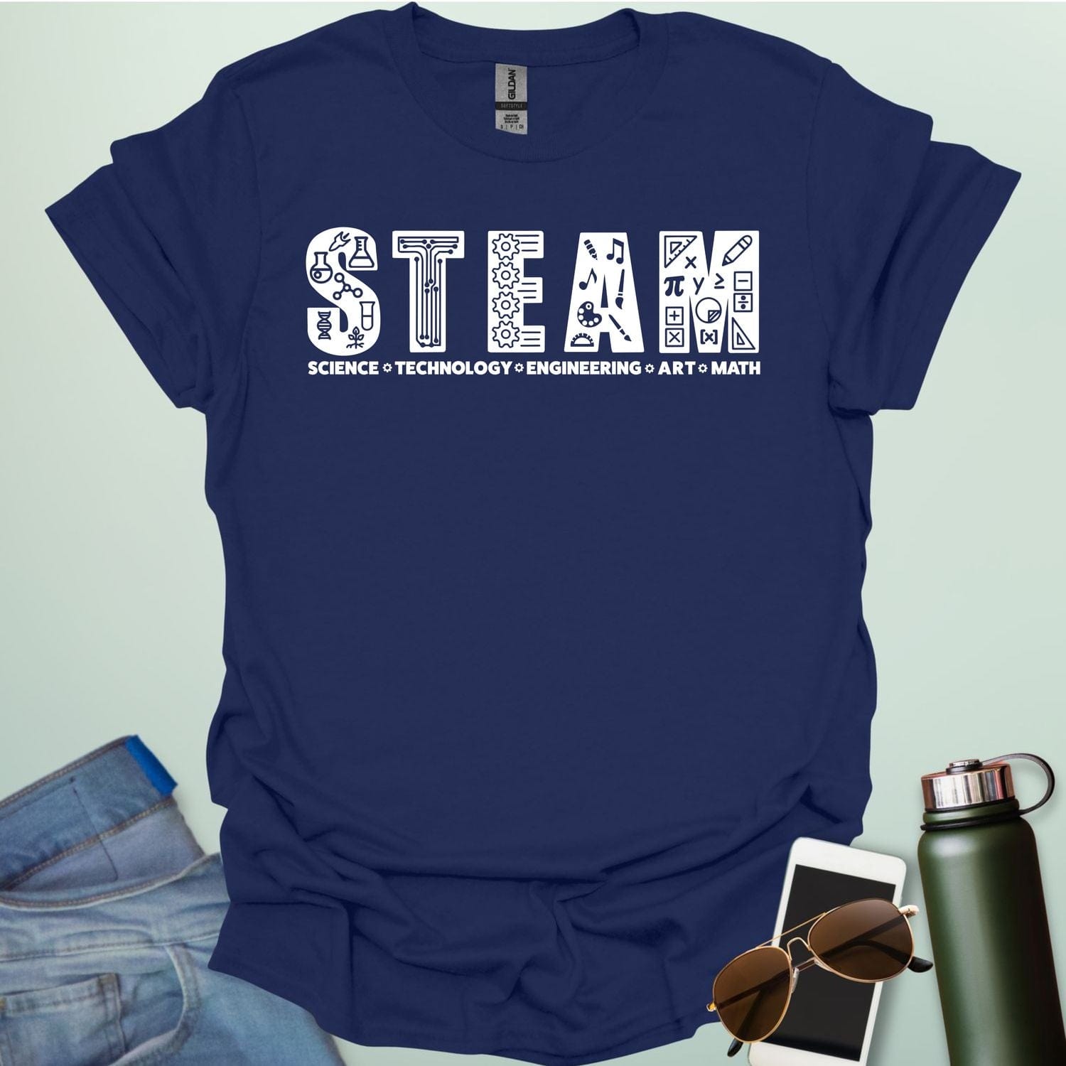 Navy blue tee with the word 'STEAM' with each letter filled with related icons, and the words 'SCIENCE TECHNOLOGY ENGINEERING ART MATH' below.