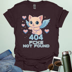 ‘404 F*cks Not Found’ t-shirt design with bold glitch/tech style lettering — a sarcastic error code humor tee.