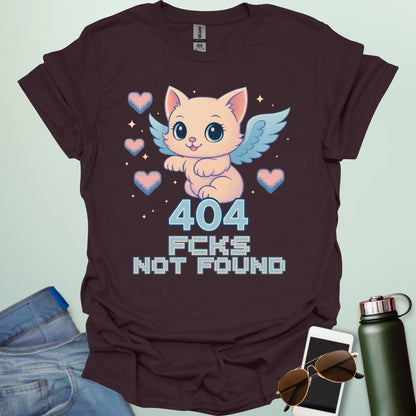 ‘404 F*cks Not Found’ t-shirt design with bold glitch/tech style lettering — a sarcastic error code humor tee.