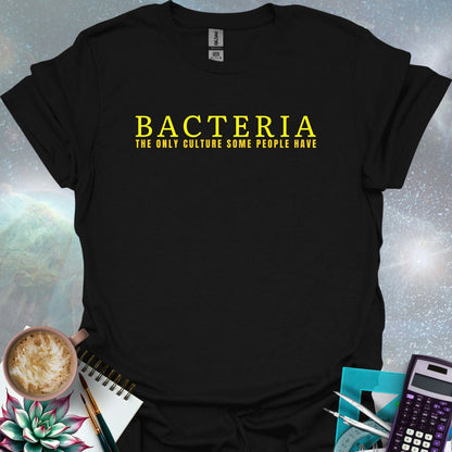 The word 'BACTERIA' in large yellow font above the text 'THE ONLY CULTURE SOME PEOPLE HAVE' in smaller yellow font on a dark green background.