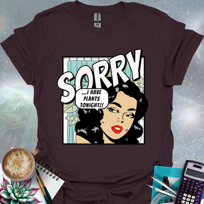 A stylized comic book illustration of a woman with dark curly hair and red lipstick looking sideways with a slightly apologetic expression. A thought bubble above her reads '...I HAVE PLANTS TONIGHT!!' The word 'SORRY' is printed in large, bold, angled letters above her head. A hint of indoor plants and a shower curtain are visible in the background.