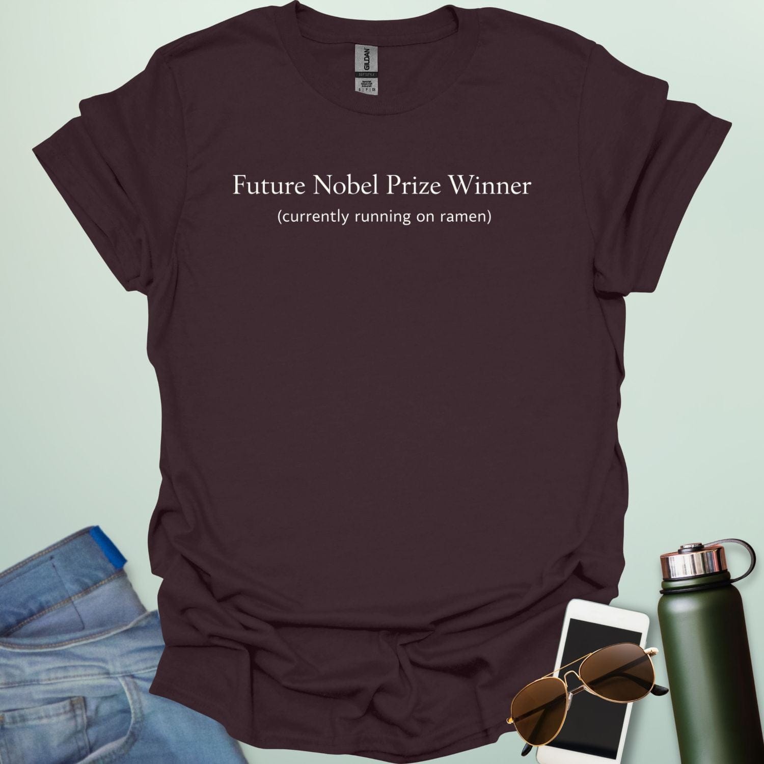 A clean typography design featuring the bold text "FUTURE NOBEL PRIZE WINNER" centered above lower-case text "currently running on ramen."