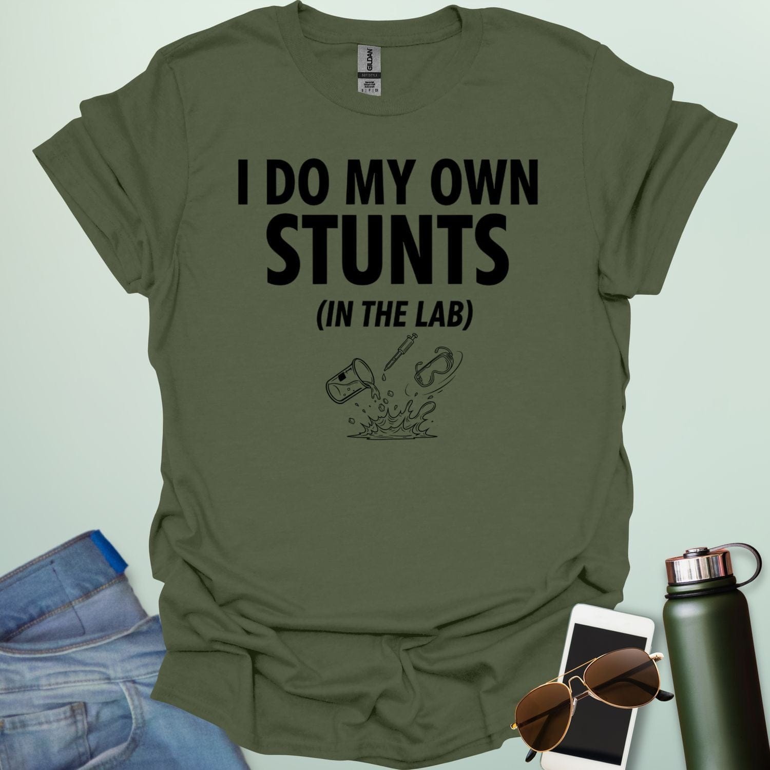 A bold graphic design featuring the text "I DO MY OWN STUNTS" in a large, blocky font with the subtext "(IN THE LAB)" positioned underneath.
