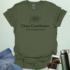 A stylish typography design featuring the words "CHAOS COORDINATOR (It's a technical term)" in a mix of bold and regular serif fonts, accented by minimalist scribbles on an XY graph.