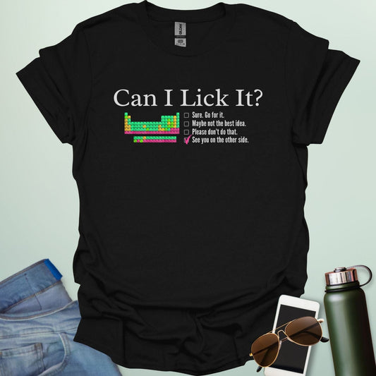 A playful science-themed graphic featuring the question "CAN I LICK IT?" in bold letters above a periodic table element-style box