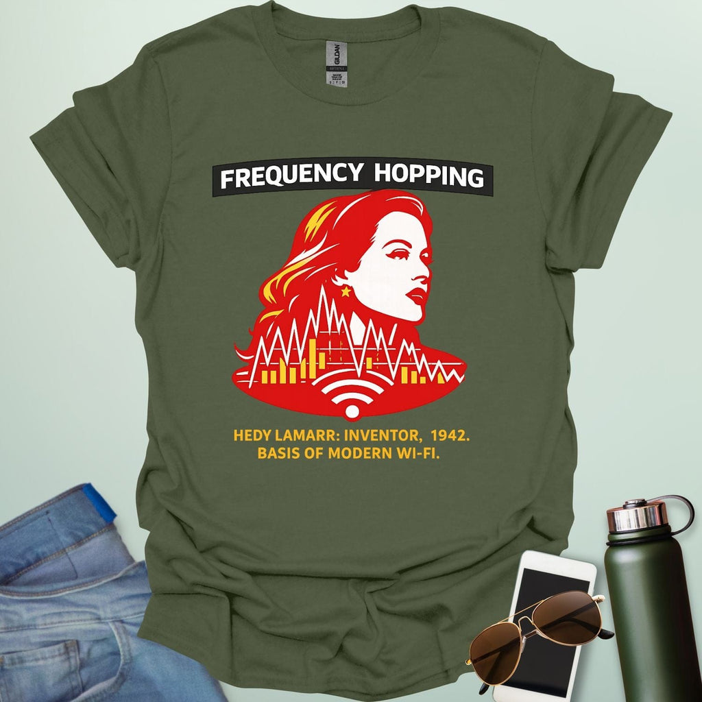 Graphic design featuring a stylized red and yellow portrait of Hedy Lamarr with signal wave patterns, Wi-Fi icons, and text reading 'FREQUENCY HOPPING' and 'HEDY LAMARR: INVENTOR, 1942. BASIS OF MODERN WI-FI.'