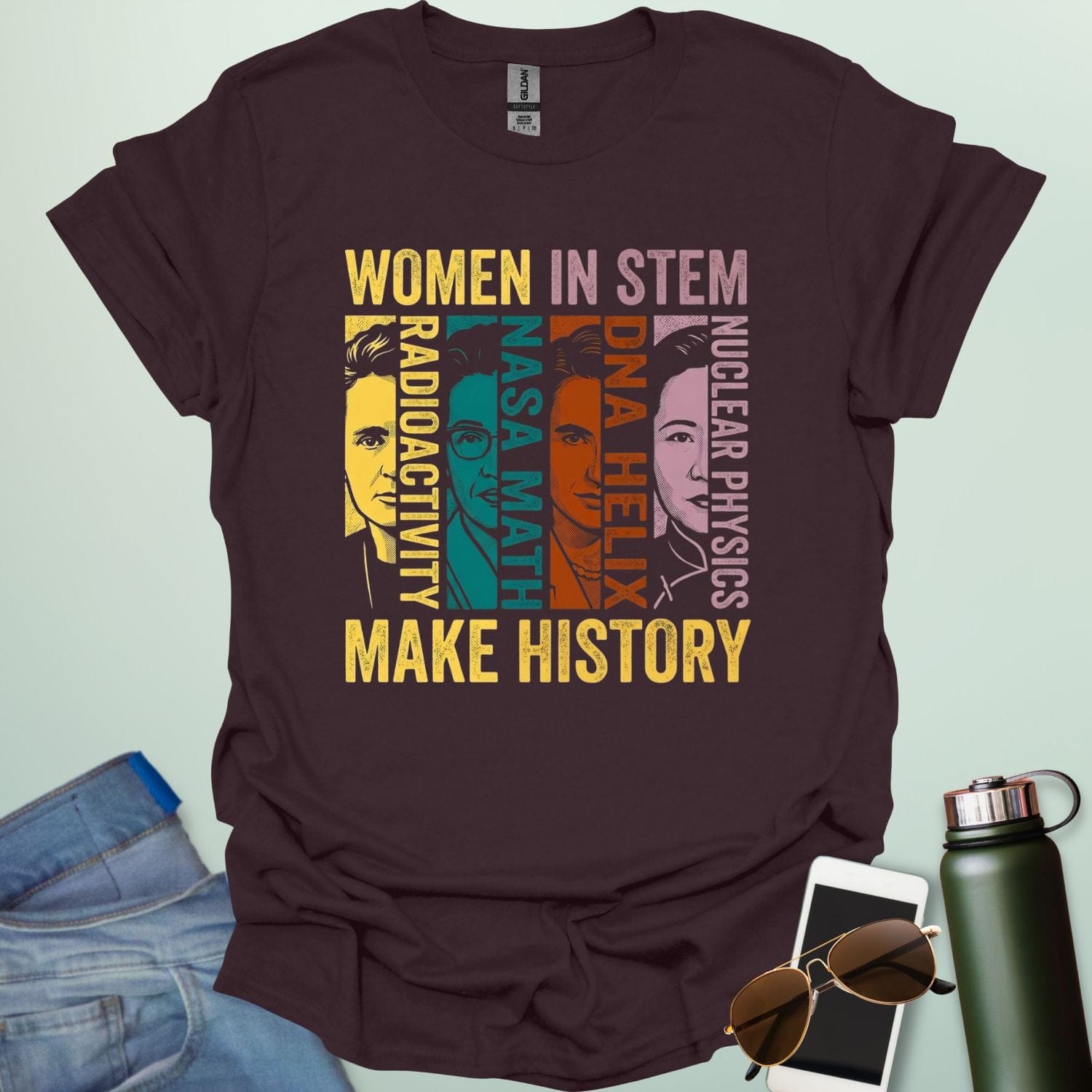 A colorful retro-style graphic featuring four portraits of famous female scientists with text labels for Radioactivity, NASA Math, DNA Helix, and Nuclear Physics, framed by the words WOMEN IN STEM MAKE HISTORY.