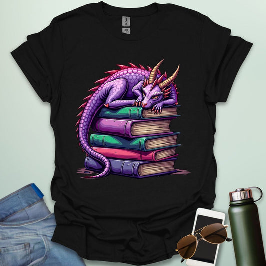 Dragon Fantasy t-shirt featuring whimsical purple dragon curled on a stack of books — perfect for fantasy fans, book lovers, and story geeks.
