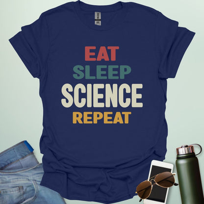Eat Sleep Science Repeat t-shirt with bold text design — funny science lifestyle shirt for STEM students, teachers, and proud geeks.
