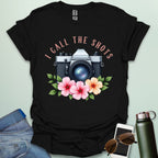 I Call the Shots t-shirt featuring a vintage camera graphic with floral accents — witty photographer humor tee for STEM and art lovers.