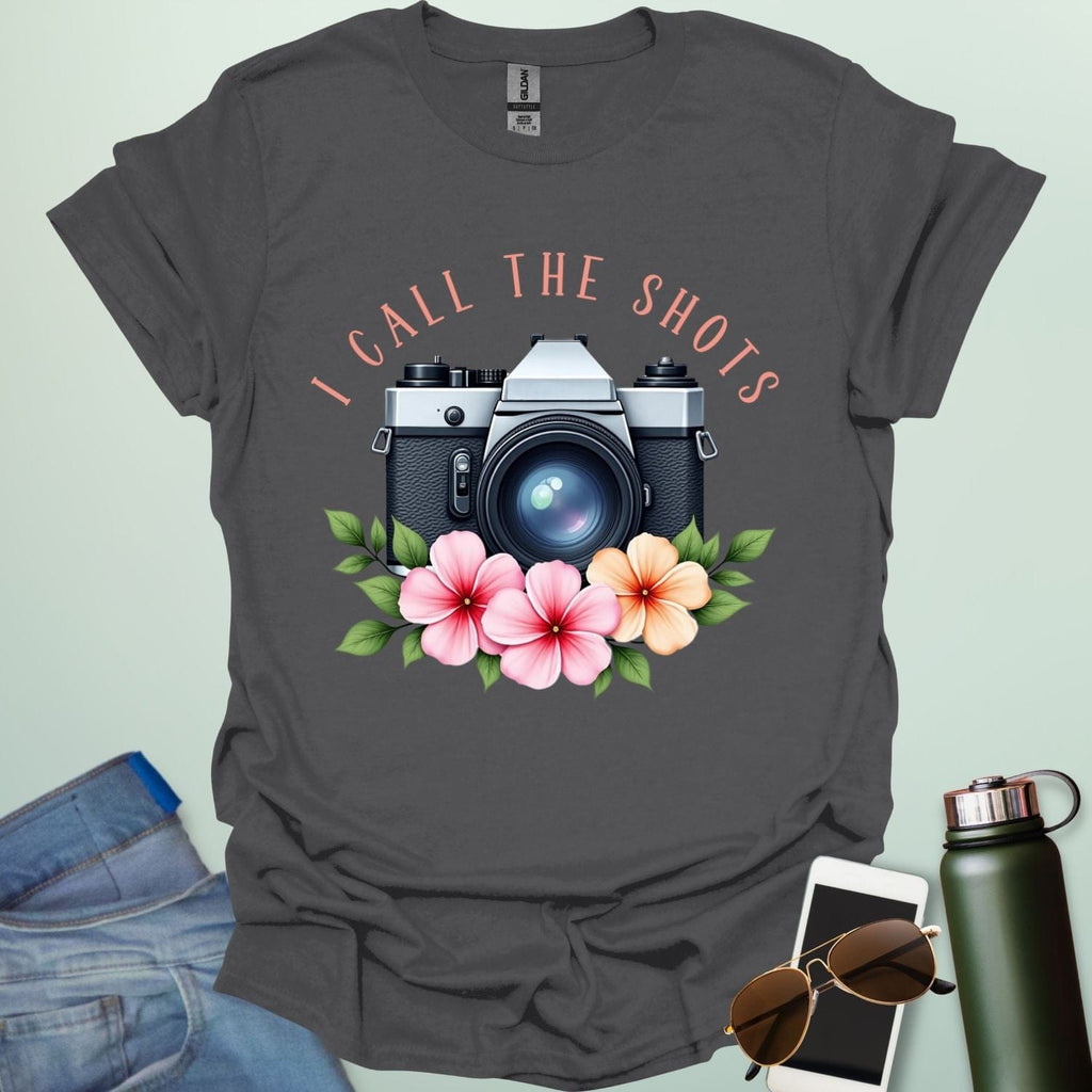 I Call the Shots t-shirt featuring a vintage camera graphic with floral accents — witty photographer humor tee for STEM and art lovers.