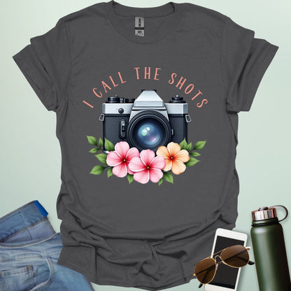I Call the Shots t-shirt featuring a vintage camera graphic with floral accents — witty photographer humor tee for STEM and art lovers.