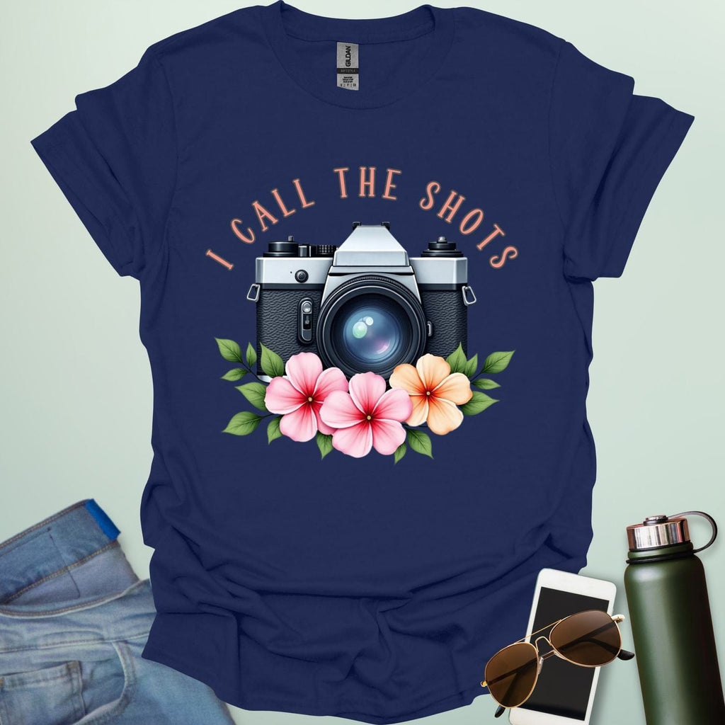 I Call the Shots t-shirt featuring a vintage camera graphic with floral accents — witty photographer humor tee for STEM and art lovers.