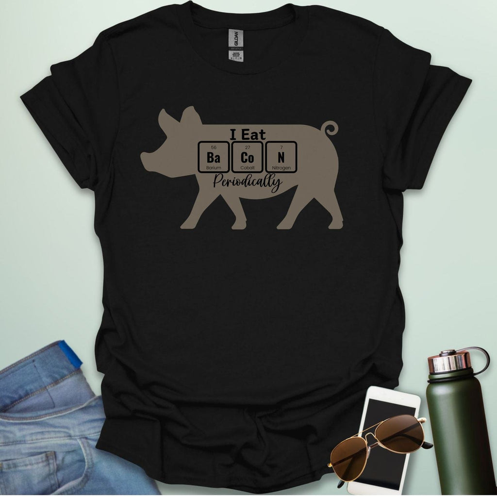 T-shirt design featuring a pig silhouette with the text 'I Eat Bacon Periodically,' where 'Bacon' is spelled using periodic table element symbols.