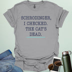 ‘Schrödinger: I Checked the Cat’s Dead’ t-shirt with bold typography — quantum physics humor design for nerds and cat lovers.