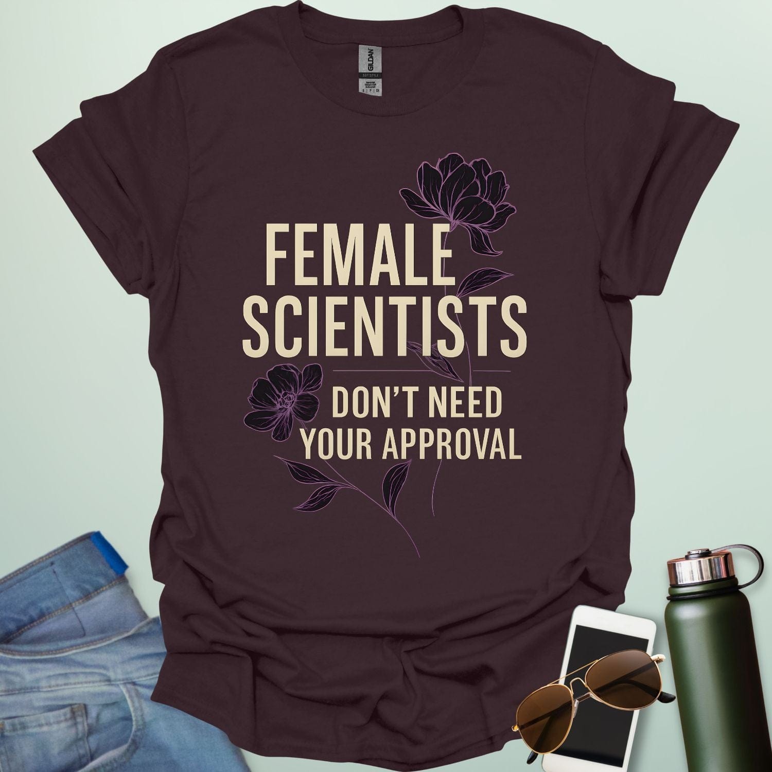 ‘Female Scientists Don’t Need Your Approval’ t-shirt with bold typography — feminist STEM apparel celebrating confident women in science.