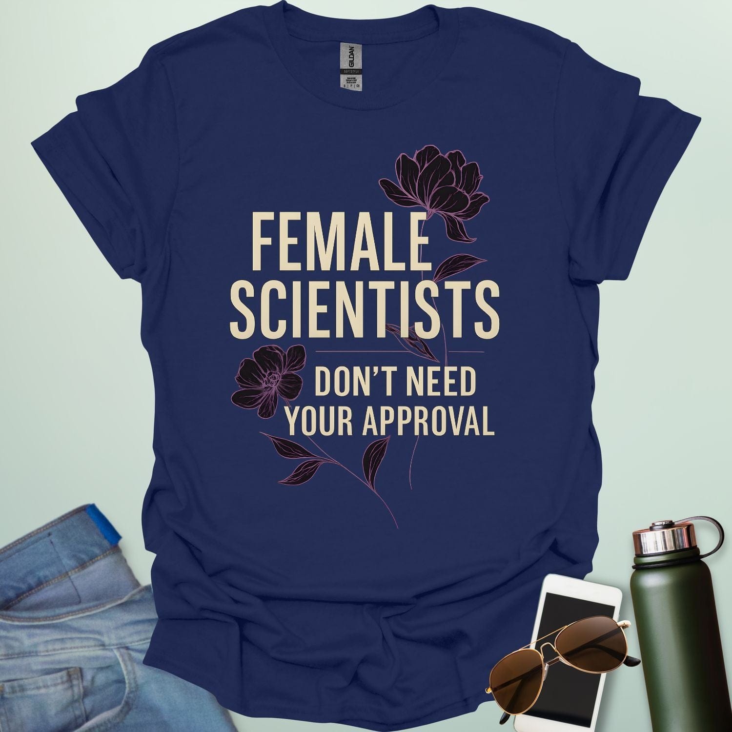 ‘Female Scientists Don’t Need Your Approval’ t-shirt with bold typography — feminist STEM apparel celebrating confident women in science.