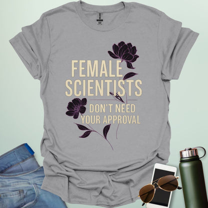 ‘Female Scientists Don’t Need Your Approval’ t-shirt with bold typography — feminist STEM apparel celebrating confident women in science.