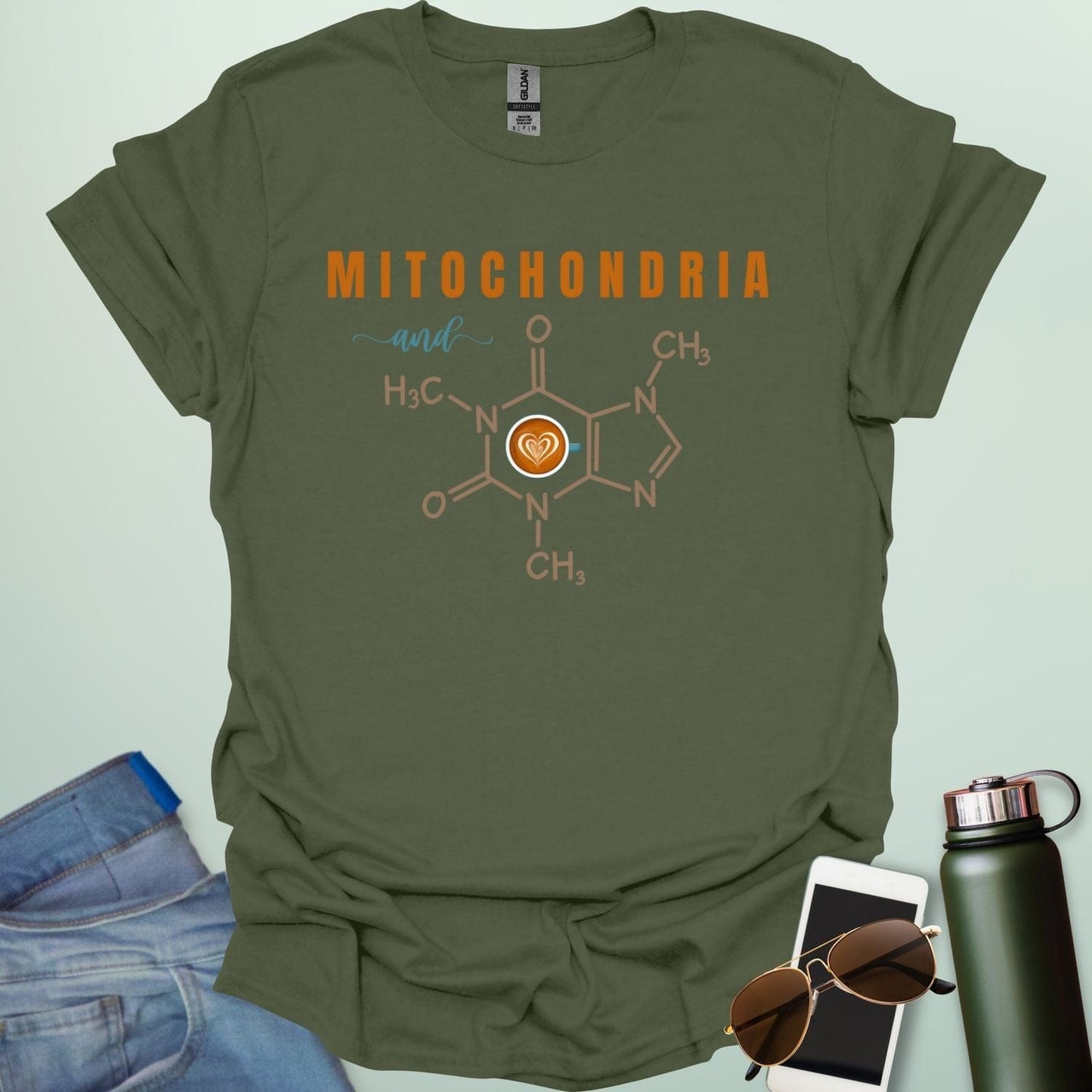 A military green t-shirt with the text 'MITOCHONDRIA and' above a graphic of the caffeine chemical structure with a coffee cup icon.
