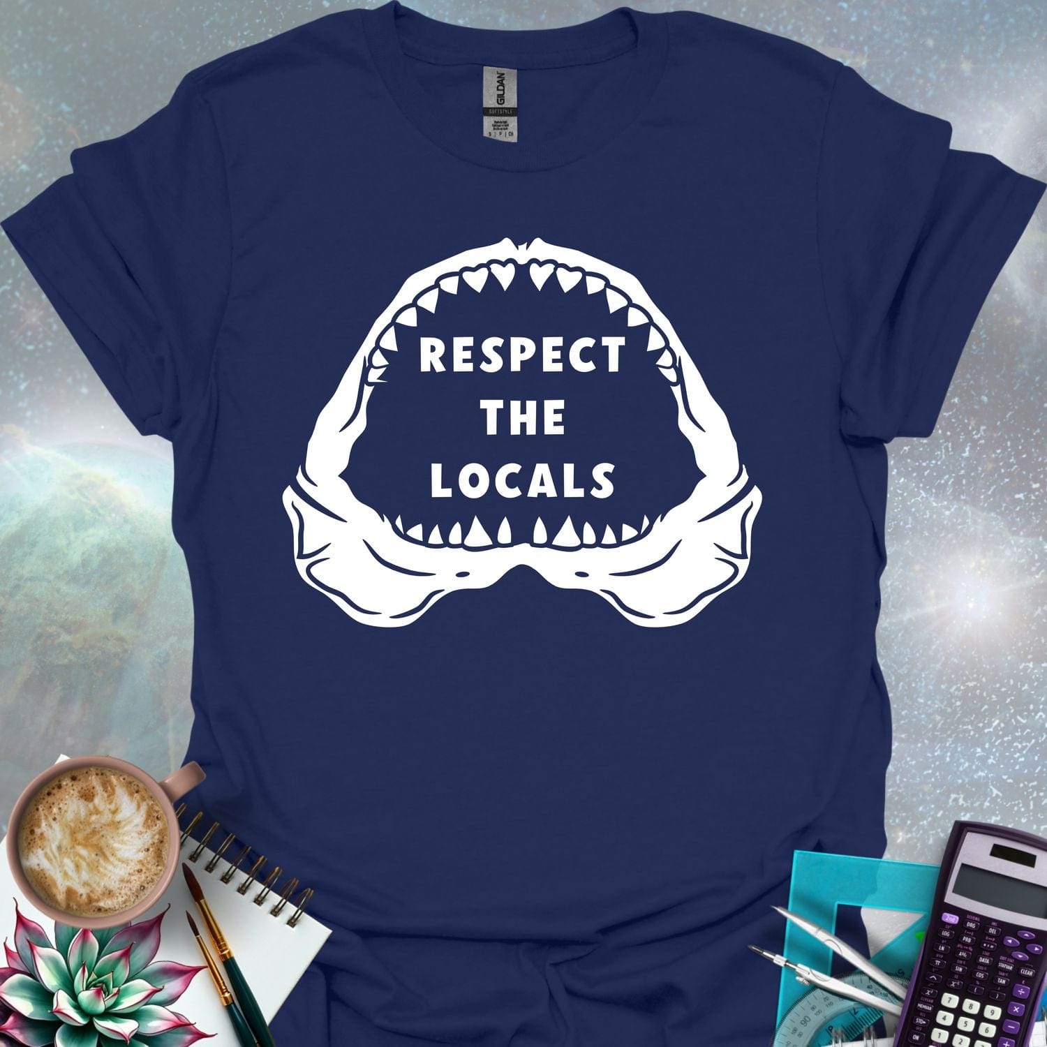 The silhouette of a menacing open shark jaw with sharp teeth, framing the text 'RESPECT THE LOCALS' in the center.