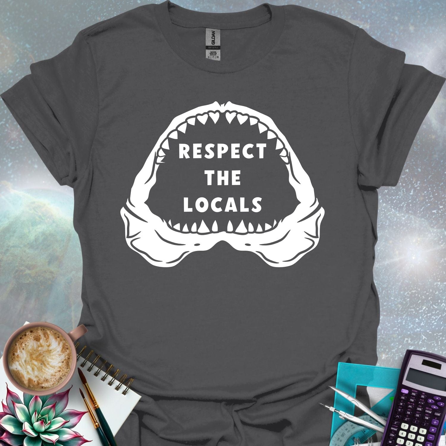 The silhouette of a menacing open shark jaw with sharp teeth, framing the text 'RESPECT THE LOCALS' in the center.