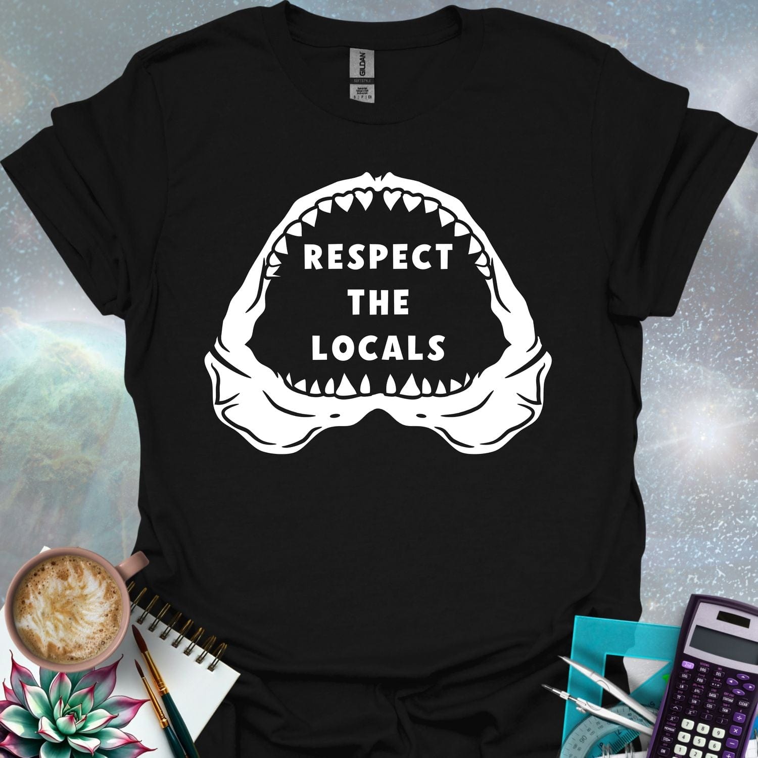 The silhouette of a menacing open shark jaw with sharp teeth, framing the text 'RESPECT THE LOCALS' in the center.