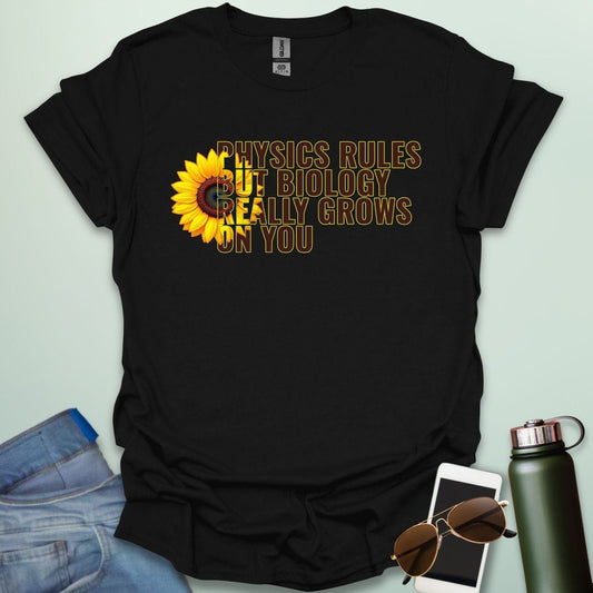 A funny biology t-shirt with a sunflower and the text 'Biology Really Grows On You,' a witty pun for biology teachers and plant lovers.