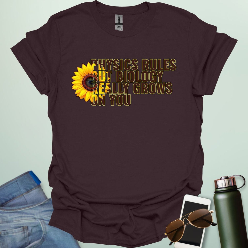 A funny biology t-shirt with a sunflower and the text 'Biology Really Grows On You,' a witty pun for biology teachers and plant lovers.