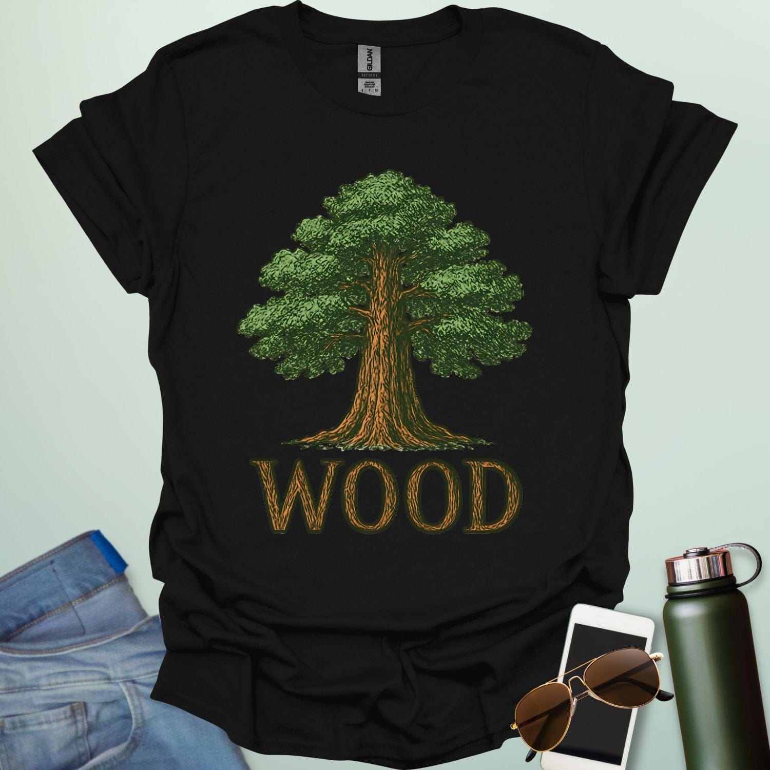 Wood tee with stylized tree / nature motif — perfect for fans of forests, national parks & Taylor Swift.