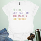 Colorful retro-style typography featuring the motivational math pun "BE LIKE SUBTRACTION AND MAKE A DIFFERENCE" in stacked green, purple, pink, and yellow text.