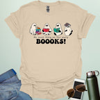 No Such Thing As Too Many Booooks t-shirt with ghostly lettering and book graphic — a spooky bookworm design for readers and teachers.