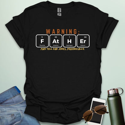 A funny periodic table t-shirt for fathers, using the elements Fluorine, Astatine, Hydrogen, and Erbium to spell 'FAtHEr'. The design says 'WARNING: FATHER MAY TELL DAD JOKES, PERIODICALLY.'