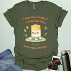 A cute cartoon graphic of a tired battery character sitting on a patch of grass with lightning bolts, atoms, and the text "I have the energy of a dead battery. It's still potential energy."