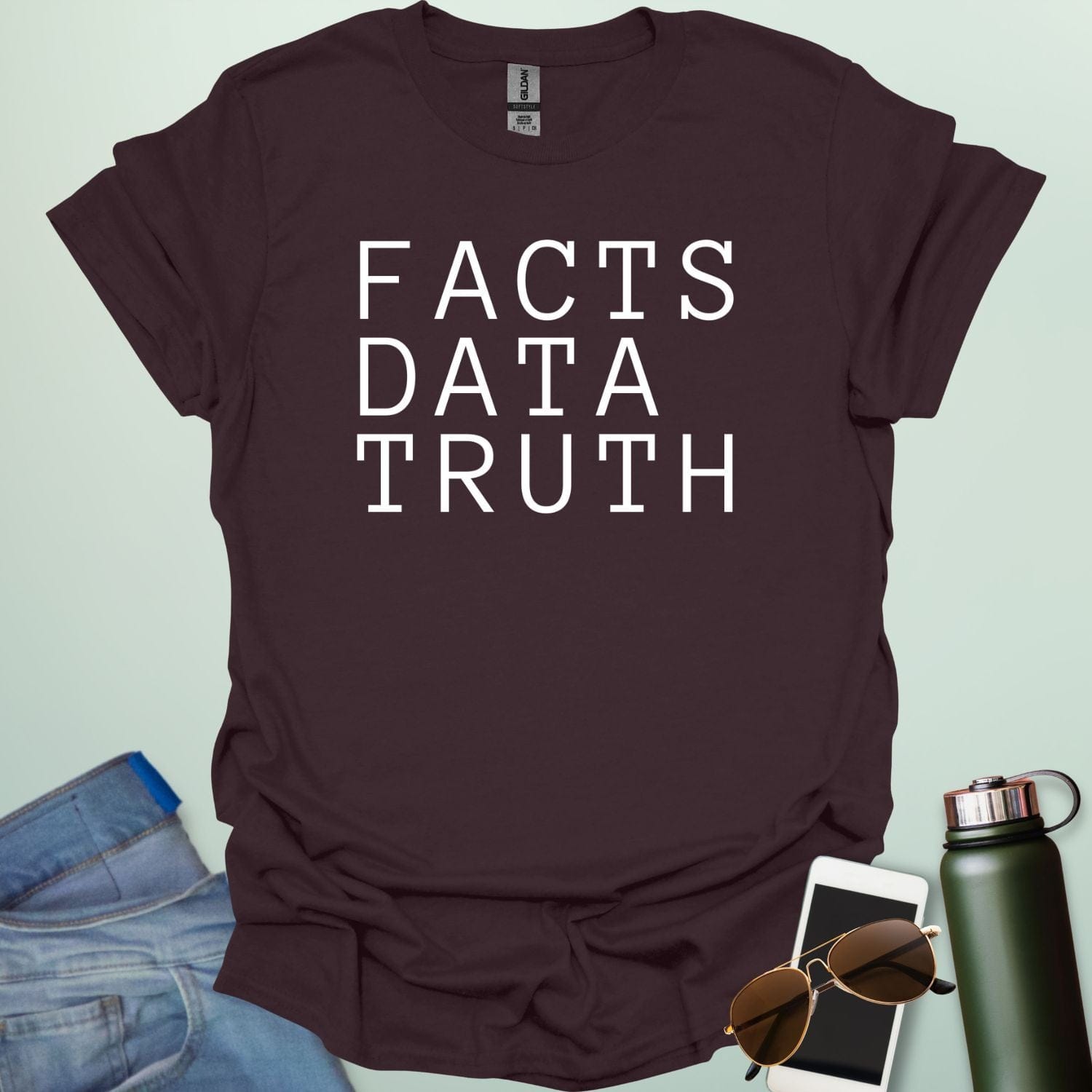 Minimalist typography design featuring the words "FACTS," "DATA," and "TRUTH" stacked vertically in a clean, black serif font.