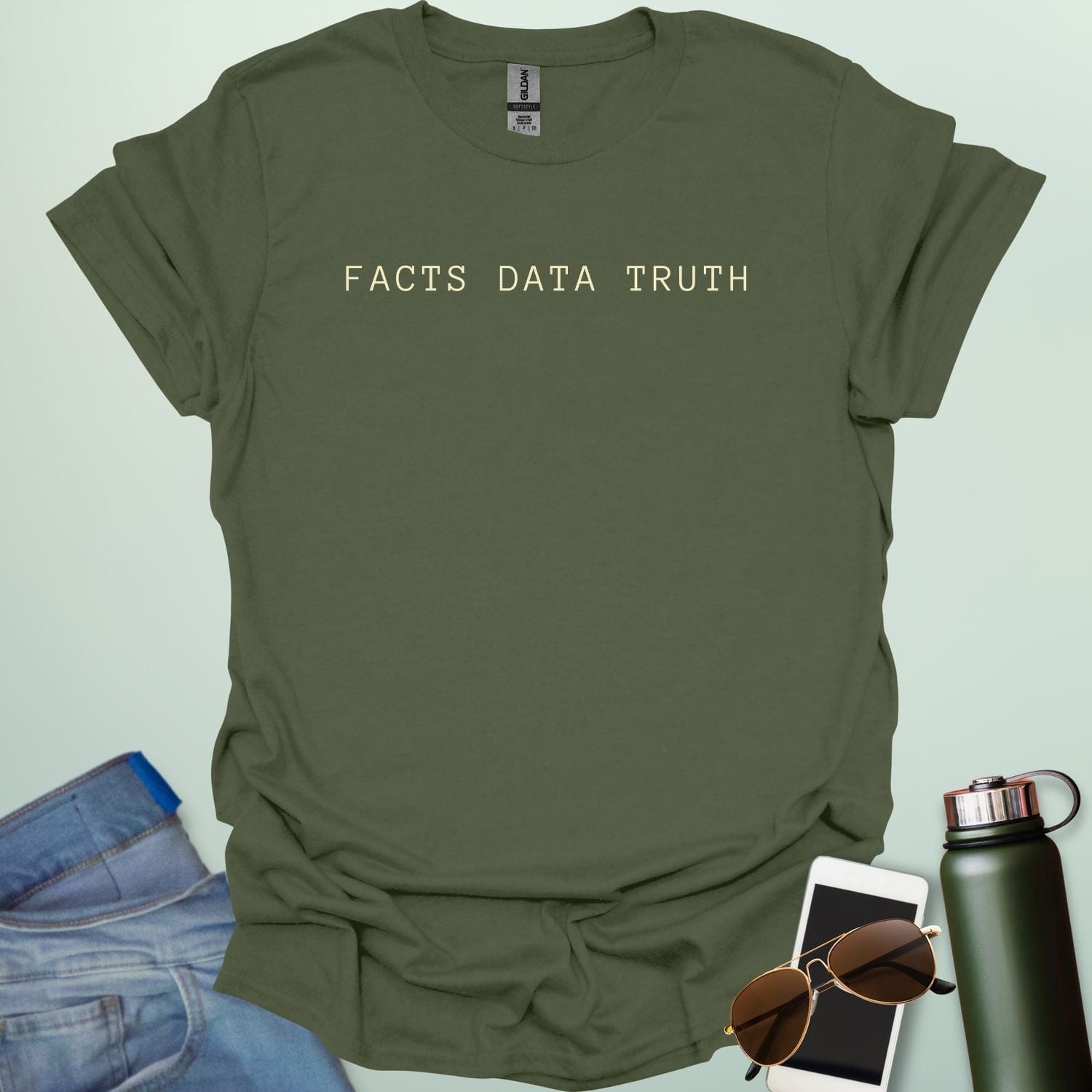 A minimalist typography design featuring the words "FACTS DATA TRUTH" arranged in a single horizontal line in a clean, serif font.