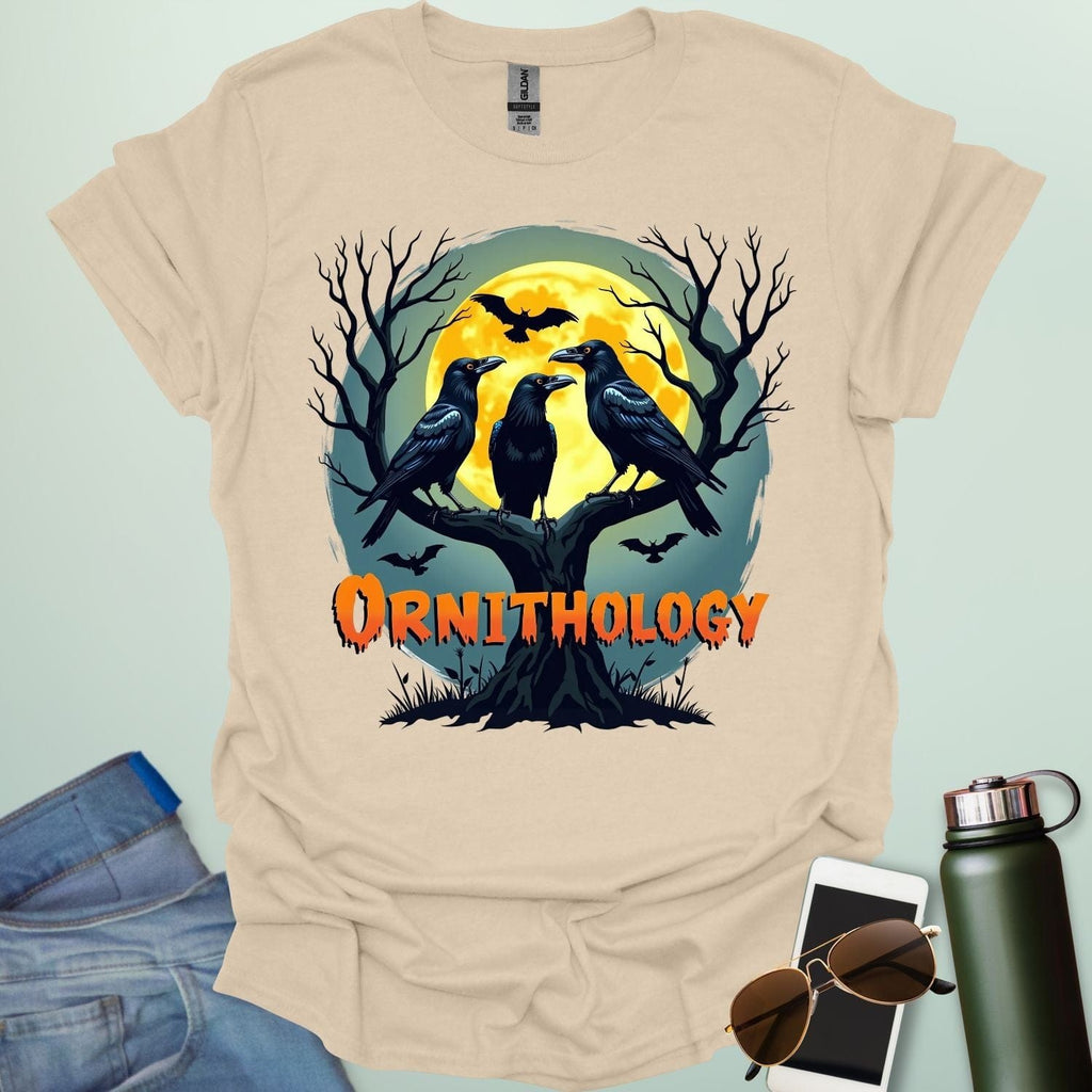 Ornithology Raven Halloween t-shirt featuring a raven perched with spooky Halloween elements — science & bird lover design.