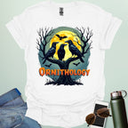 Ornithology Raven Halloween t-shirt featuring a raven perched with spooky Halloween elements — science & bird lover design.