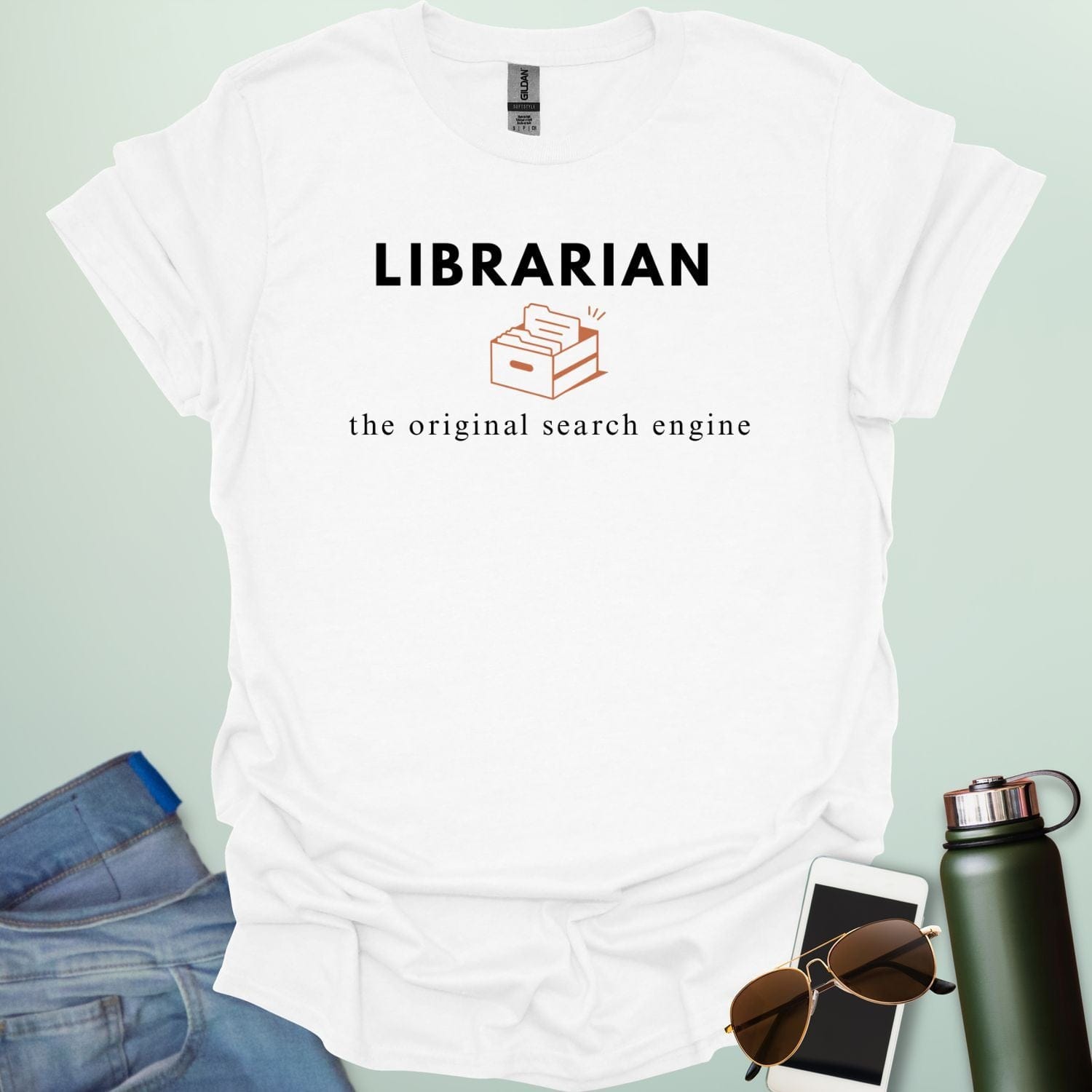 A graphic design featuring the word "LIBRARIAN" in bold sans-serif text above an illustration of an open file box with folders and the phrase "the original search engine" below.